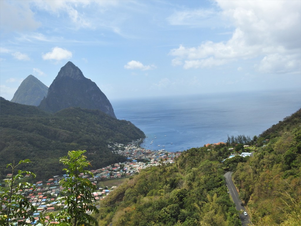A view of Soufriere in St. Lucia from the Castries-Soufriere Highway showing the magnificent pitons in the background.